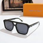 Black acetate sunglasses with dark gray lenses and monogram temples.