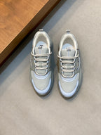 Light blue mesh lace-up sneakers with chunky sole and blue plaid side detail