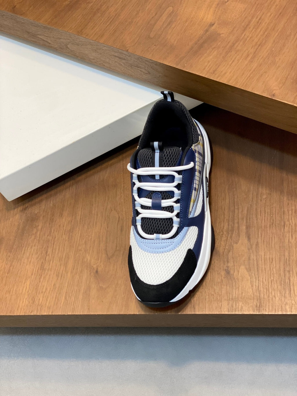 Dior unisex lace-up sneakers, navy and white uppers with light blue stripe detail