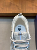 Light blue mesh sneaker with lace-up straps and Dior detail on the heel