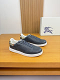 Dark navy leather sneakers with white rubber sole and lace-up front