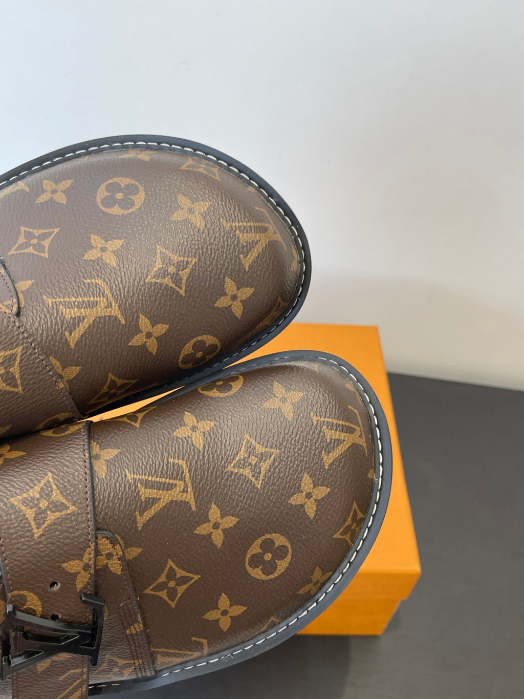 Louis Vuitton monogram sandals with side buckle strap detail and stitched edge