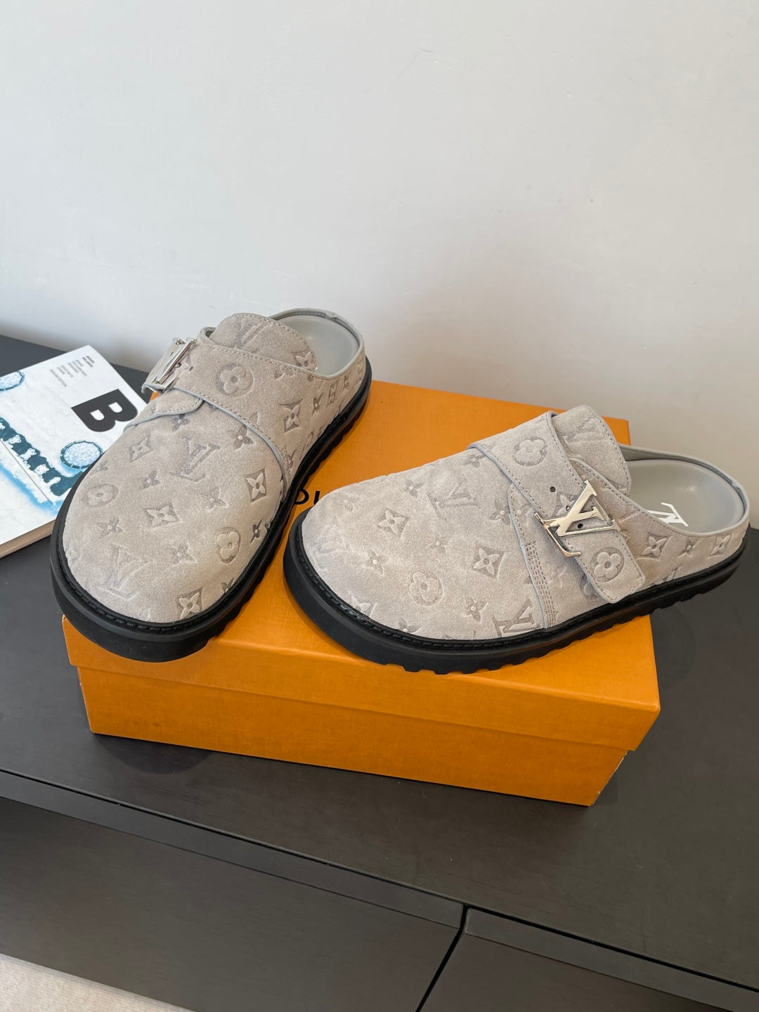 Louis Vuitton monogram slide sandals, pair view of beige canvas with buckle strap