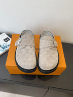 Louis Vuitton monogram sandals, beige canvas with adjustable strap and black sole