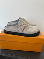 Louis Vuitton monogram slide sandals, beige canvas with buckle strap and black tread