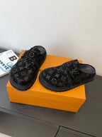 Louis Vuitton black monogram slide sandals, pair view with adjustable strap