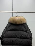 Long black puffer jacket back with tan fur hood trim
