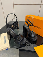 Black high-heel sandals with platform sole and front logo buckle