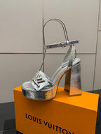 Ladies' Louis Vuitton platform heeled sandals, front view, silver metallic