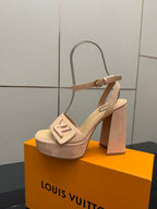 Beige Louis Vuitton platform heeled sandal with square heel and front buckle