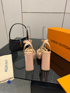 Beige Louis Vuitton heeled sandals with front buckle detail and block heel