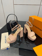 Beige Louis Vuitton heeled sandals with slingback strap and thick platform sole