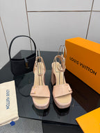 Beige Louis Vuitton heeled sandals with ankle strap and gold-tone hardware