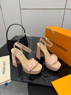 Beige Louis Vuitton platform heeled sandals with adjustable ankle strap
