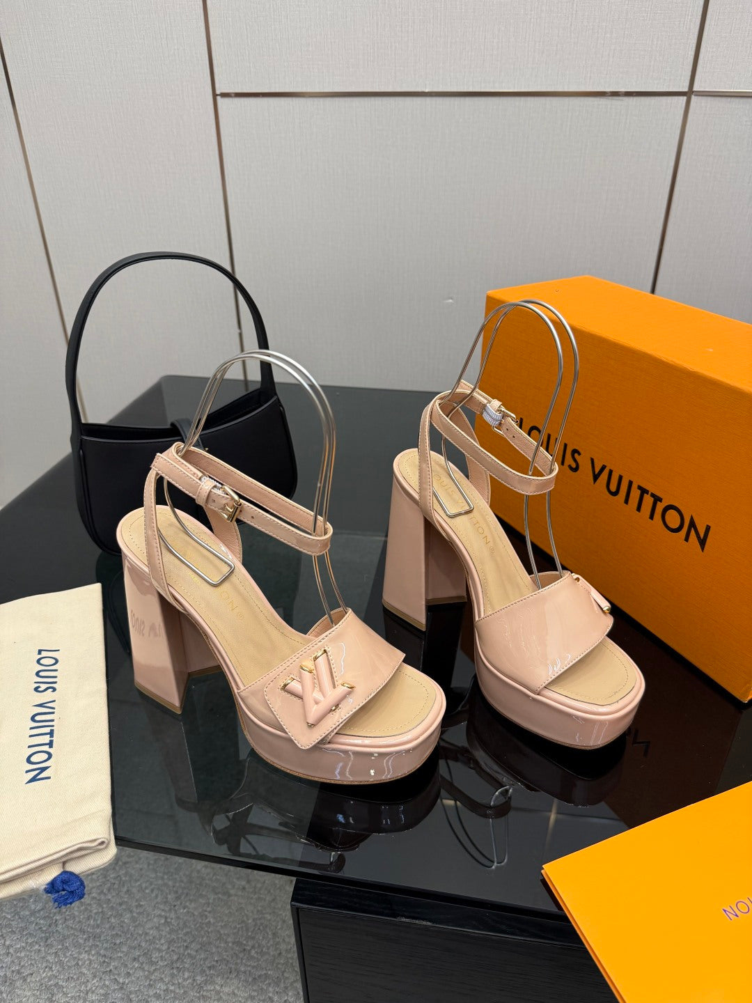 Beige Louis Vuitton platform heeled sandals with adjustable ankle strap