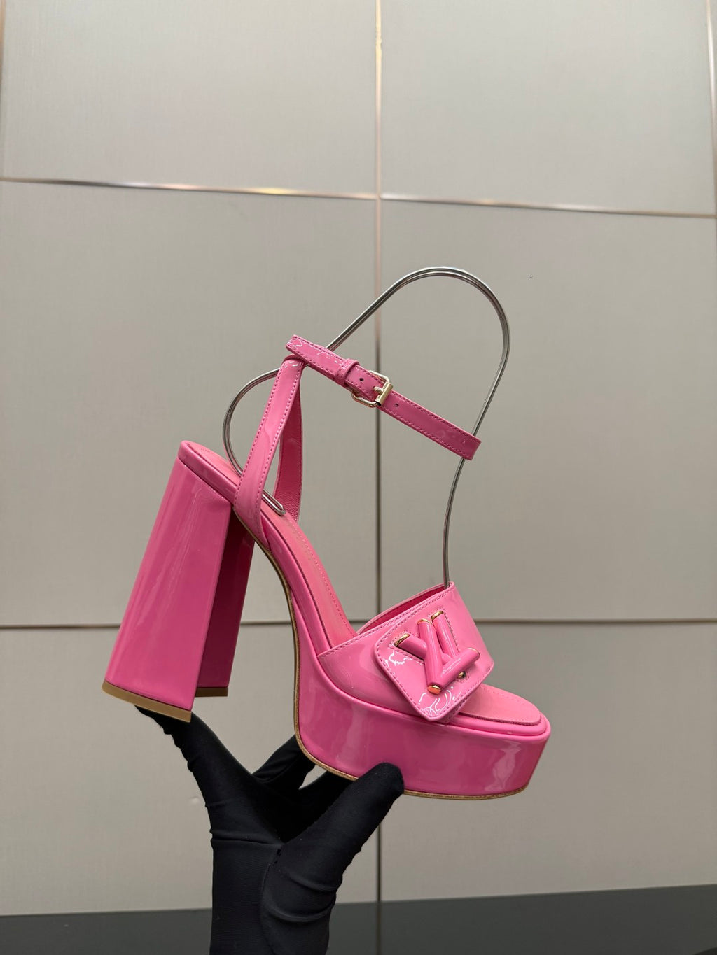 Women’s pink platform heeled sandals with ankle strap and thick platform sole