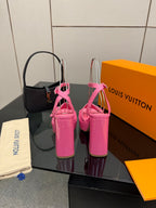 Women’s pink platform heeled sandals with T-strap and adjustable buckle