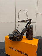 Louis Vuitton women's platform heeled sandals with dark monogram straps and block heel