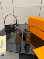 Louis Vuitton women's platform heeled sandals in dark monogram with black toe and heel
