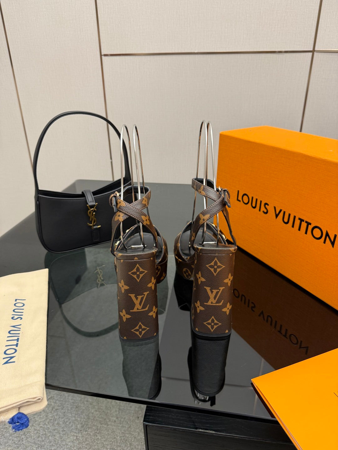 Louis Vuitton women's platform heeled sandals in dark monogram with black toe and heel