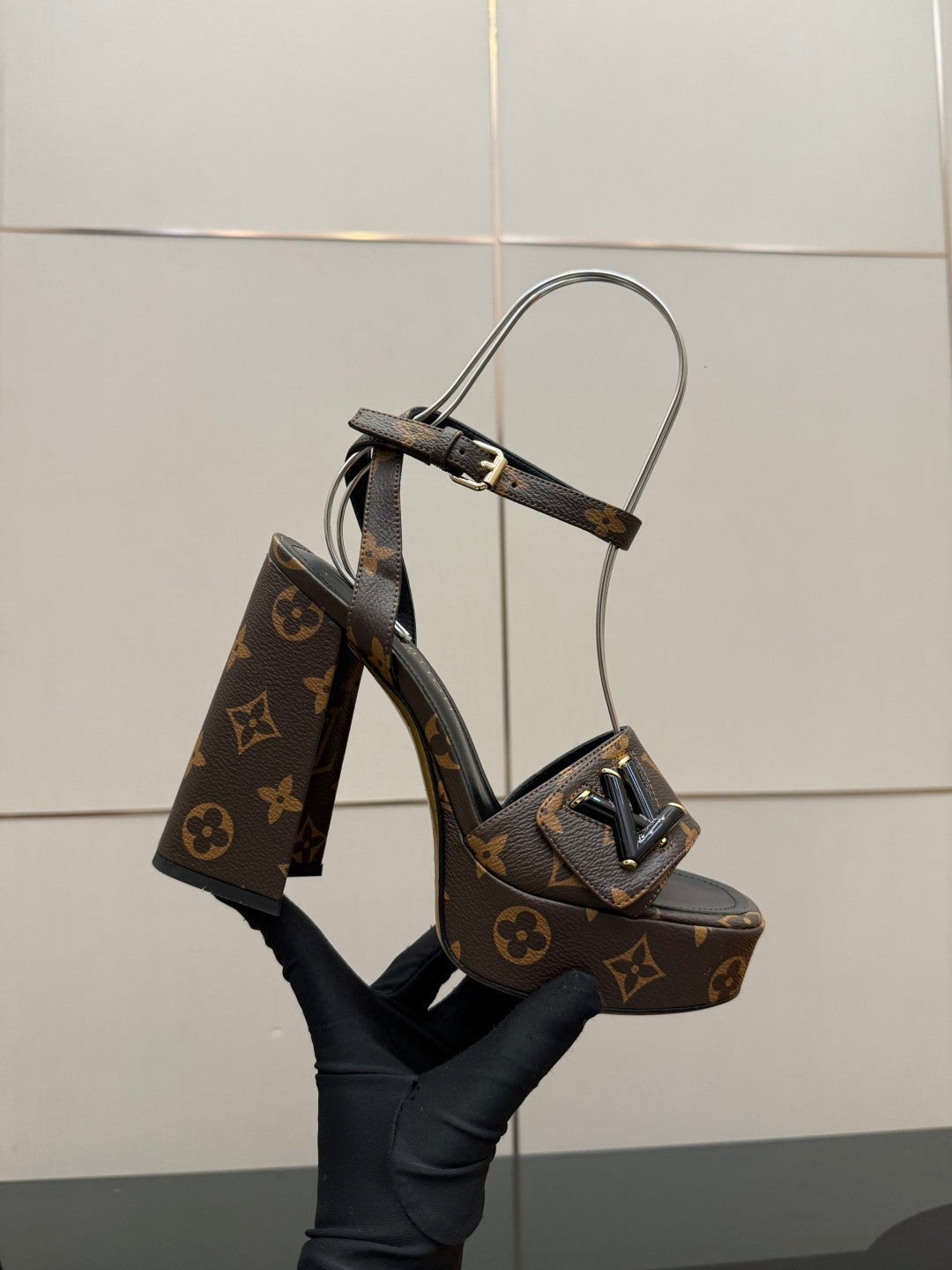 Louis Vuitton women's platform heeled sandals in dark monogram with open-toe strap