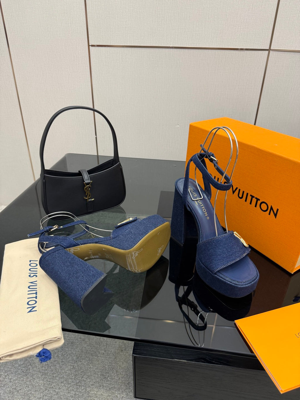 Blue platform heeled sandals with gold logo buckle and thick block heel