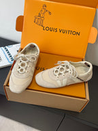 Beige Louis Vuitton unisex sneakers in box with white laces and side star details