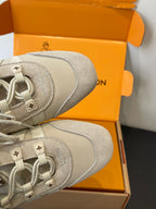 Louis Vuitton sneakers heel view, light beige canvas with logo patches, in box