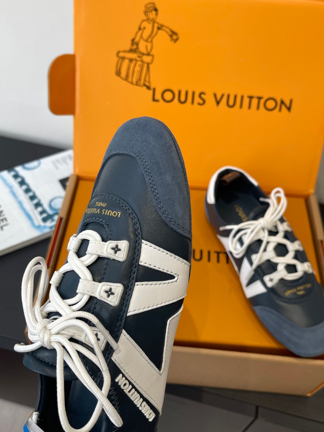 Louis Vuitton unisex sneakers profile, white laces and navy suede with light blue panels