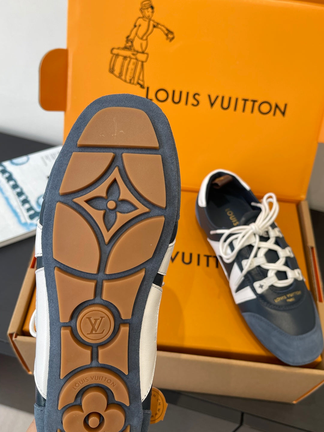 Louis Vuitton unisex sneaker outsole, patterned tread on dark blue shoe sole