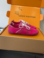Unisex pink lace-up sneakers with side strap detail and white laces