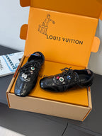 Louis Vuitton unisex black lace-up sneakers with multicolor charms, top view
