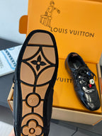 Louis Vuitton unisex sneaker outsole view with dark tread and logo stamp