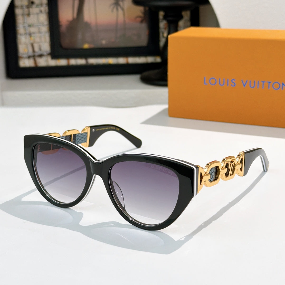 Louis Vuitton cat-eye sunglasses with black frame, purple lenses, gold chain detail