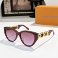 Louis Vuitton cat-eye sunglasses with burgundy frame, purple lenses, gold chain detail