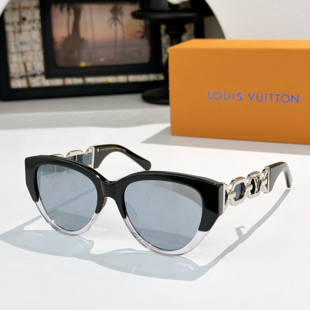 Louis Vuitton cat-eye sunglasses with black frame, blue-tinted lenses, gold chain detail