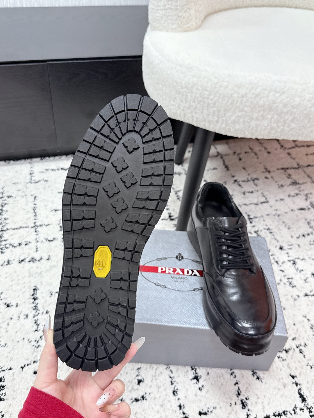 Prada unisex leather lace-up sneakers, dark black, tread outsole view