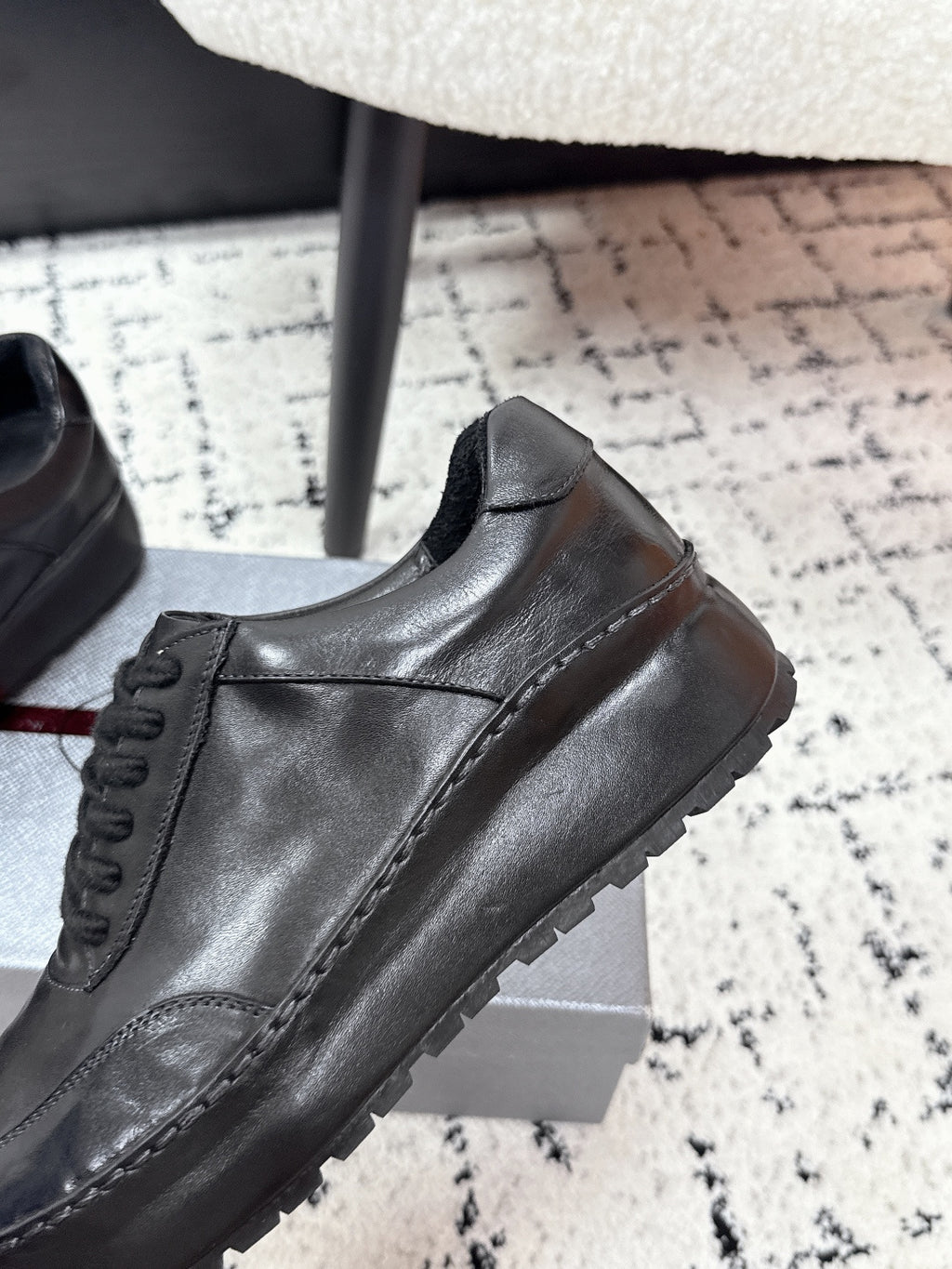 Prada unisex leather lace-up sneakers, dark black, side panel and sole