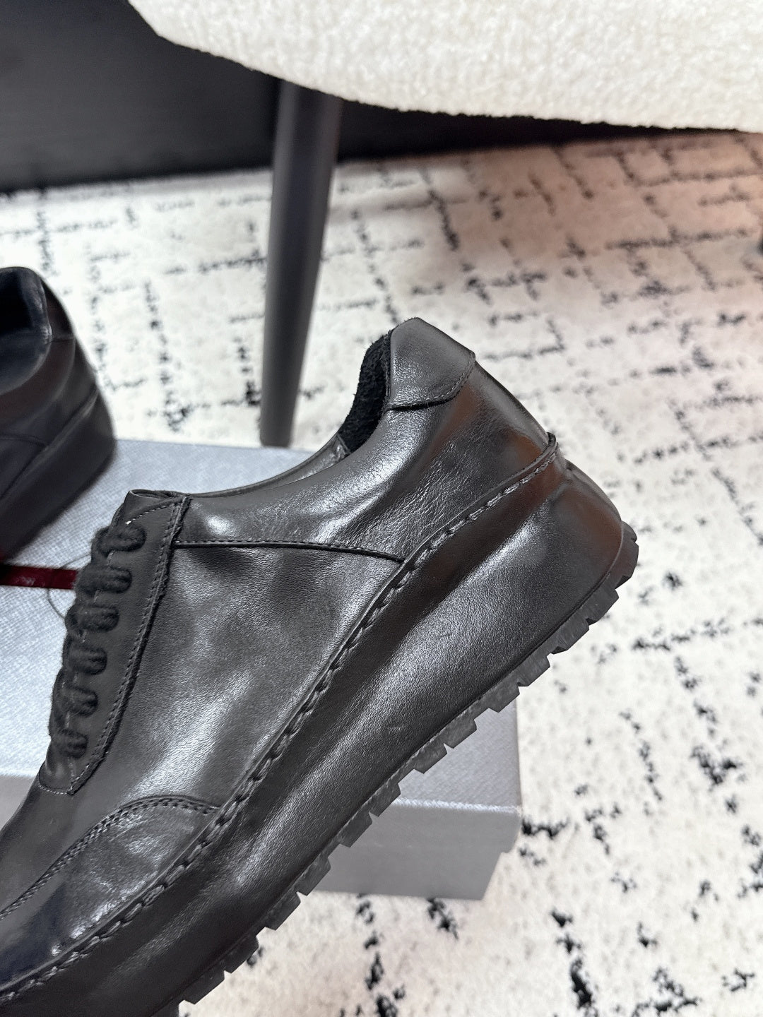 Prada unisex leather lace-up sneakers, dark black, side panel and sole