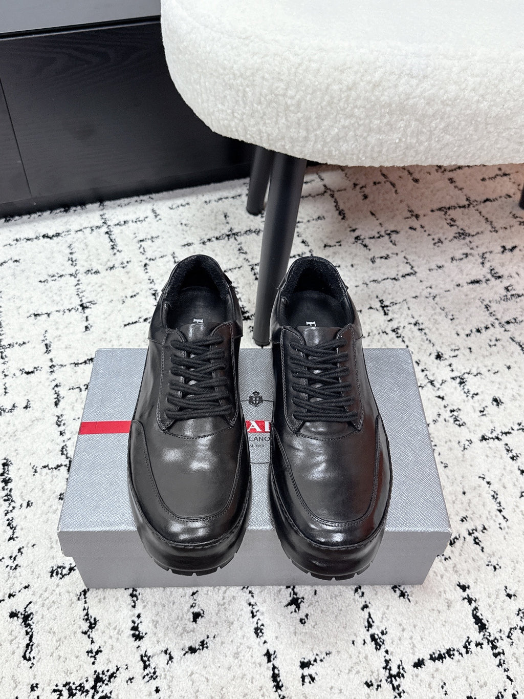 Prada unisex leather lace-up sneakers, dark black, on box