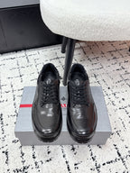Prada unisex leather lace-up sneakers, dark black, on box