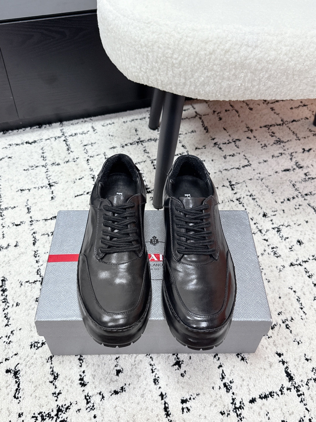 Prada unisex leather lace-up sneakers, dark black, on box