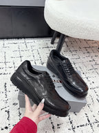 Prada unisex leather lace-up sneakers, dark black, front and lace-up style