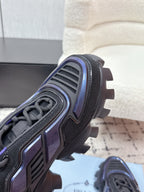 Prada unisex shoes heel close-up, dark gray tread with blue stripe accents