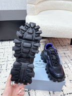 Prada unisex shoes outsoles, rugged dark tread with Prada logo