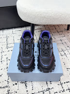 Prada unisex shoes, dark gray with blue trim and purple collar, chunky tread