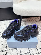Prada unisex shoes side view, dark gray with blue accents and purple interior