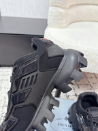 Prada unisex sneakers, black, close-up of heel and side mesh with sculpted sole lugs
