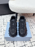 Prada unisex sneakers in black with chunky lug sole and lace-up panel detailing