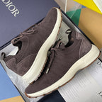 Dior unisex knit sneakers in dark purple with white sole and lace-up front detail
